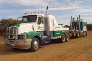 heavy tow truck towing a truck