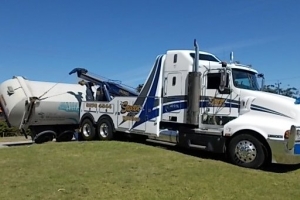 heavy tow truck recovering a truck