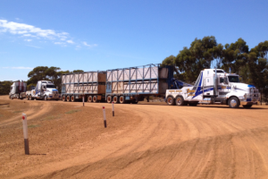 tow trucks transports agriculture equipment