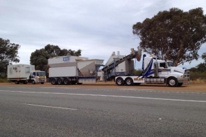 heavy tow truck towing agriculture equipment