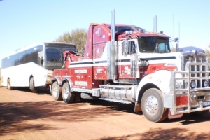 heavy tow truck towing a bus